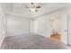 Spacious main bedroom with neutral colors and a large walk-in closet at 5845 Hampton Ct, Atlanta, GA 30349