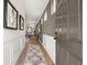 Bright entryway with hardwood floors, wainscoting, and view to living area at 213 Bastian Dr # 6, Villa Rica, GA 30180
