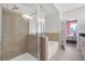Detailed bathroom with a large shower and tub, designed for a luxurious and relaxing experience at 390 17Th Nw St # 4063, Atlanta, GA 30363