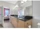 Spacious bathroom with dual sinks and access to the bedroom, designed for convenience and comfort at 390 17Th Nw St # 4063, Atlanta, GA 30363