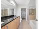 Elegant bathroom featuring granite countertops and modern fixtures, blending style with functionality at 390 17Th Nw St # 4063, Atlanta, GA 30363