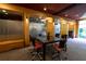 A modern conference room with a dark wood table, stylish chairs, and soft lighting at 390 17Th Nw St # 4063, Atlanta, GA 30363