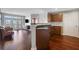 Open floor plan showcasing the living room and kitchen with hardwood flooring at 390 17Th Nw St # 4063, Atlanta, GA 30363