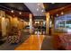 Elegant lobby area with wood flooring, pillars, seating, and large windows for plenty of light at 390 17Th Nw St # 4063, Atlanta, GA 30363