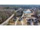 Aerial view of three new homes with a close-up inset at 4410 Ross Estates Ct, Snellville, GA 30039