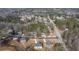 Aerial view of three new homes near a main road at 4410 Ross Estates Ct, Snellville, GA 30039