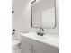 Modern bathroom with gray vanity and black matte fixtures at 4410 Ross Estates Ct, Snellville, GA 30039