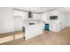 Modern kitchen with white cabinets and island at 4410 Ross Estates Ct, Snellville, GA 30039