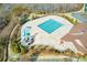 Aerial view of the large community pool, featuring a winding slide and ample deck space for relaxation at 2475 Barley Crest Pass, Cumming, GA 30040