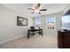 Home office with large windows, desk, and chair at 2475 Barley Crest Pass, Cumming, GA 30040