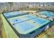 Multiple well-maintained tennis courts with lights and new surfaces for friendly matches at 2475 Barley Crest Pass, Cumming, GA 30040