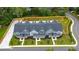 Aerial view of townhomes with community green space at 702 Fairgate Rd, Marietta, GA 30064