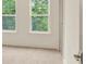 Spacious bedroom with large windows and neutral carpeting at 702 Fairgate Rd, Marietta, GA 30064