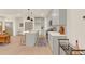 Open concept kitchen boasting gray cabinets, white countertops, and a spacious island at 702 Fairgate Rd, Marietta, GA 30064