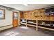 Unfinished basement space with storage shelves and exposed insulation at 2423 Cedar Wood Ct, Marietta, GA 30068