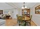 Bright dining area with wood table, chairs and a view to the living room at 3486 Essex Ave # 88, Atlanta, GA 30339