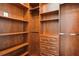 Spacious walk-in closet with ample shelving and drawers at 390 17Th Nw St # 4057, Atlanta, GA 30363