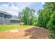 House exterior, backyard, and wooded area at 5649 Eagles Watch, Douglasville, GA 30135