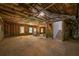 Unfinished basement with exposed framing and plumbing at 5649 Eagles Watch, Douglasville, GA 30135
