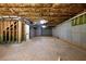 Unfinished basement area with concrete floor and walls at 5649 Eagles Watch, Douglasville, GA 30135