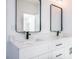 Double vanity bathroom with quartz countertop and black accents at 5649 Eagles Watch, Douglasville, GA 30135