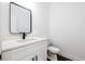 Small bathroom with single vanity and black matte fixtures at 5649 Eagles Watch, Douglasville, GA 30135