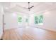 Light-filled bedroom with hardwood floors and backyard access at 5649 Eagles Watch, Douglasville, GA 30135