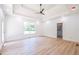Bright bedroom featuring hardwood floors and an ensuite bathroom at 5649 Eagles Watch, Douglasville, GA 30135
