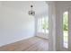 Bright dining room with hardwood floors and large windows at 5649 Eagles Watch, Douglasville, GA 30135
