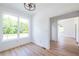 Bright dining room with hardwood floors and large windows at 5649 Eagles Watch, Douglasville, GA 30135