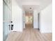 Bright entryway with light hardwood floors and neutral walls at 5649 Eagles Watch, Douglasville, GA 30135