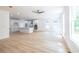 Living area with hardwood floors and access to back deck and kitchen at 5649 Eagles Watch, Douglasville, GA 30135