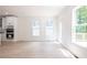 Living room with hardwood floors and large windows providing natural light at 5649 Eagles Watch, Douglasville, GA 30135