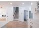 View of staircase leading upstairs from kitchen and living areas at 5649 Eagles Watch, Douglasville, GA 30135
