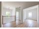 Bright upper hall with hardwood floors, leading to bedrooms and bonus area at 5649 Eagles Watch, Douglasville, GA 30135