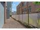 Long, narrow backyard with a privacy fence at 640 Glen Iris Ne Dr # 303, Atlanta, GA 30308