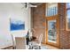Bright dining area with exposed brick and city views at 640 Glen Iris Ne Dr # 303, Atlanta, GA 30308