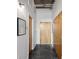 Interior hallway with concrete floors and exposed pipes at 640 Glen Iris Ne Dr # 303, Atlanta, GA 30308