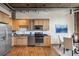 Modern kitchen with stainless steel appliances and light wood cabinets at 640 Glen Iris Ne Dr # 303, Atlanta, GA 30308