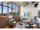 Spacious living room with hardwood floors and large windows at 640 Glen Iris Ne Dr # 303, Atlanta, GA 30308