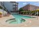 Community pool with a spa and plenty of lounge chairs at 640 Glen Iris Ne Dr # 303, Atlanta, GA 30308