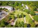 Aerial view of community featuring green space, walking paths, and residential building at 1708 Evenstad Way, Smyrna, GA 30080