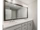 Double vanity bathroom with large mirror and modern fixtures at 1708 Evenstad Way, Smyrna, GA 30080