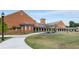 Brick community center with clock tower and landscaping at 1708 Evenstad Way, Smyrna, GA 30080