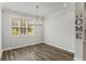 Bright dining room featuring hardwood floors and a chandelier at 1708 Evenstad Way, Smyrna, GA 30080
