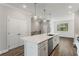 Modern kitchen with white cabinets and stainless steel appliances at 1708 Evenstad Way, Smyrna, GA 30080