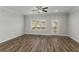 Spacious living room with hardwood floors and ceiling fan at 1708 Evenstad Way, Smyrna, GA 30080