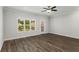 Spacious living room with hardwood floors and access to patio at 1708 Evenstad Way, Smyrna, GA 30080