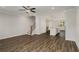 Open living room with hardwood floors and kitchen view at 1708 Evenstad Way, Smyrna, GA 30080