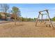 Community playground with climbing structures and swings at 1708 Evenstad Way, Smyrna, GA 30080